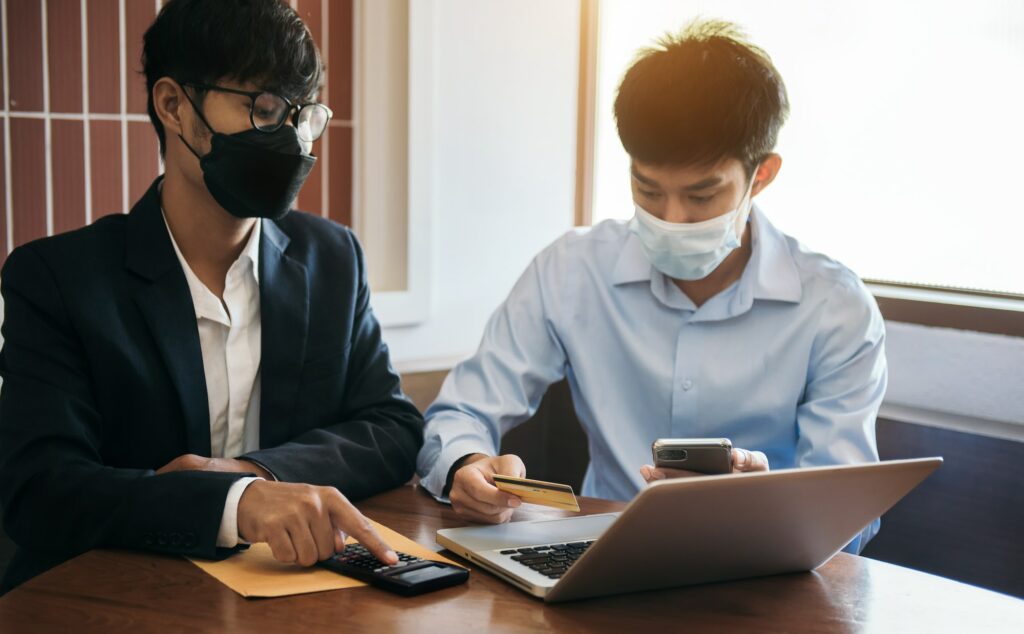 Business team and stock market or forex graph suitable for financial investment concept.