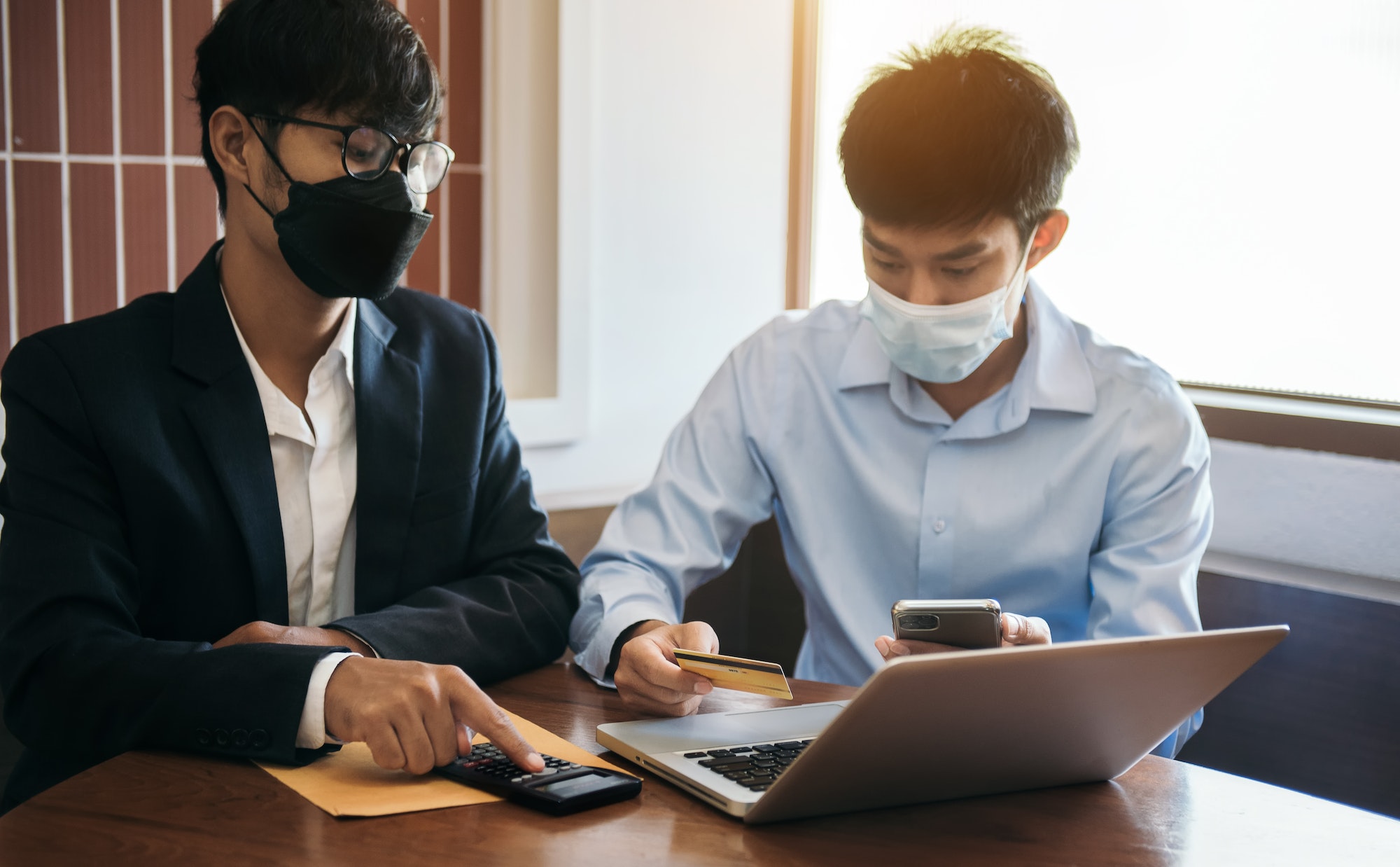 Business team and stock market or forex graph suitable for financial investment concept.